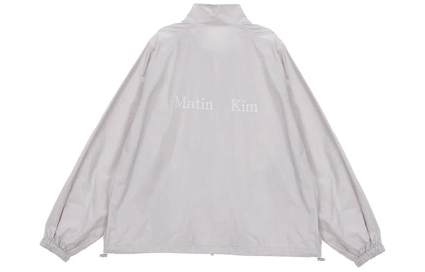 MATIN KIM Logo Coated Raglan Jacket Gray