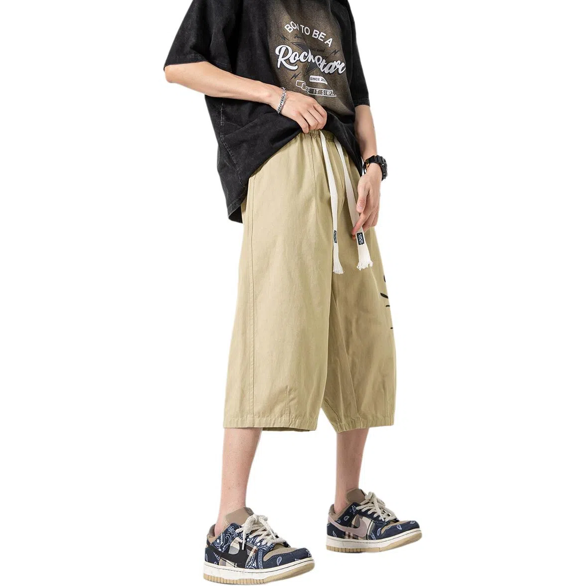 功夫熊猫 美式复古未来主义风手绘卡通动漫字母印花轻薄舒适透气凉感织带抽绳侧边排扣设计时尚宽松阔腿七分休闲短裤 男女同款