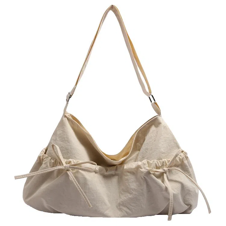 德力熊 小众设计休闲斜挎包纯色褶皱抽绳轻便 尼龙 单肩包 女款 黑色/灰色/白色/黄色/蓝色