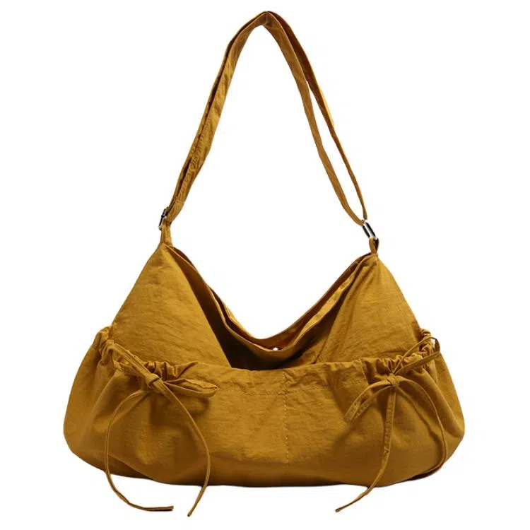 德力熊 小众设计休闲斜挎包纯色褶皱抽绳轻便 尼龙 单肩包 女款 黑色/灰色/白色/黄色/蓝色