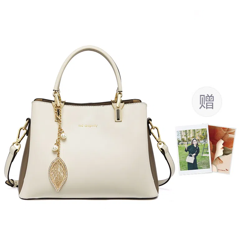 红蜻蜓 时尚百搭树叶吊饰小众拼接撞色 牛皮/超细纤维合成革 手提包斜挎包 女款 米白色